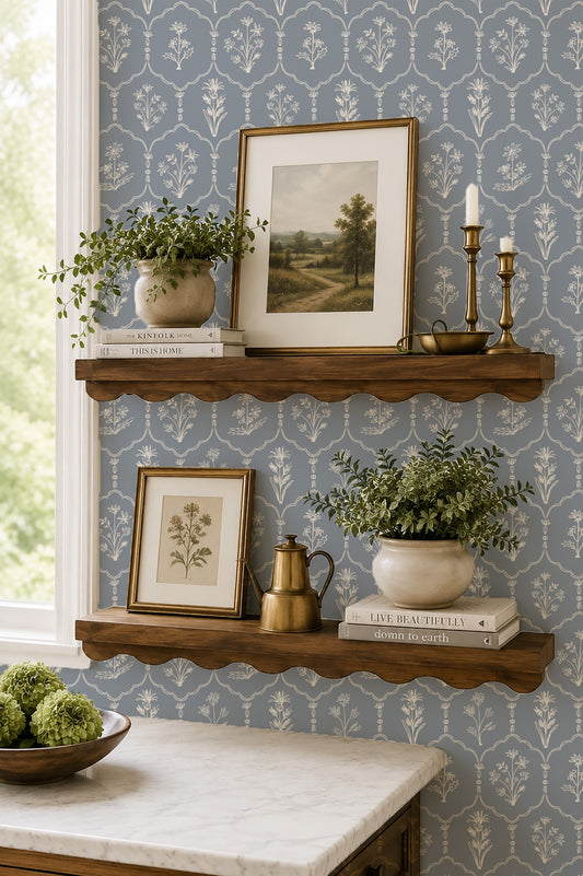 Floral trellis dusty blue wallpaper with white florals in a classic room setting.