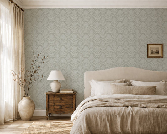 Sage damask wallpaper in elegant bedroom with neutral decor and soft lighting.