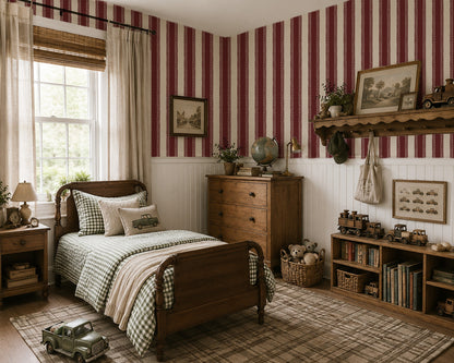 Burgundy lace-striped wallpaper in cozy vintage bedroom with wood furniture.