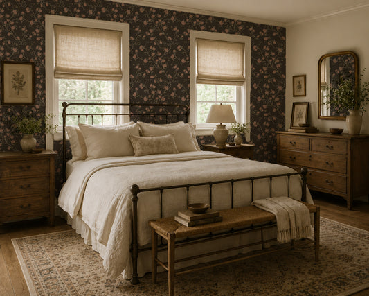 Charcoal floral wallpaper with pink roses and hummingbirds in vintage bedroom decor.