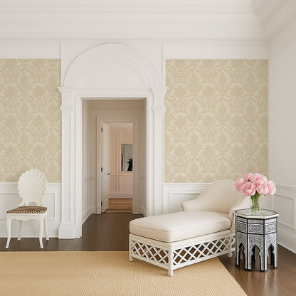 Cream damask wallpaper in elegant room with chaise lounge and floral decor.