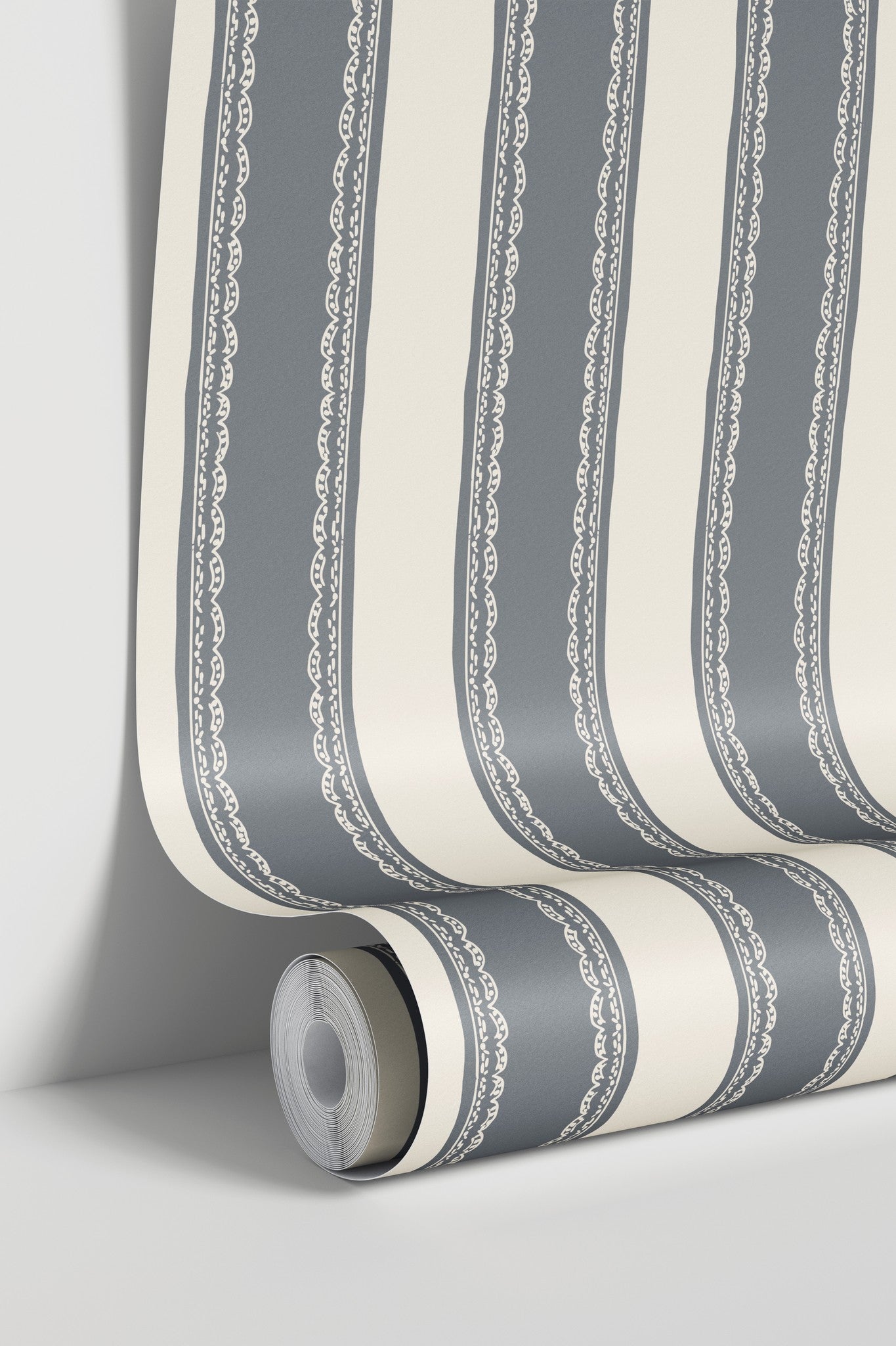 Dusty blue lace-striped wallpaper with ivory background in a roll.