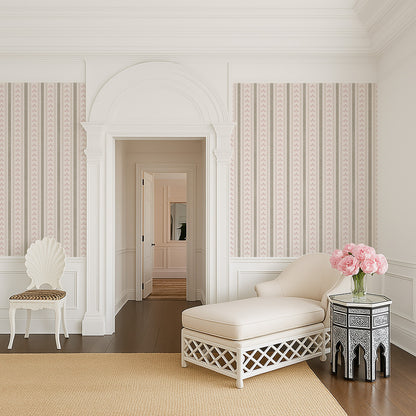Dusty rose and sage striped floral wallpaper in elegant living room setting.