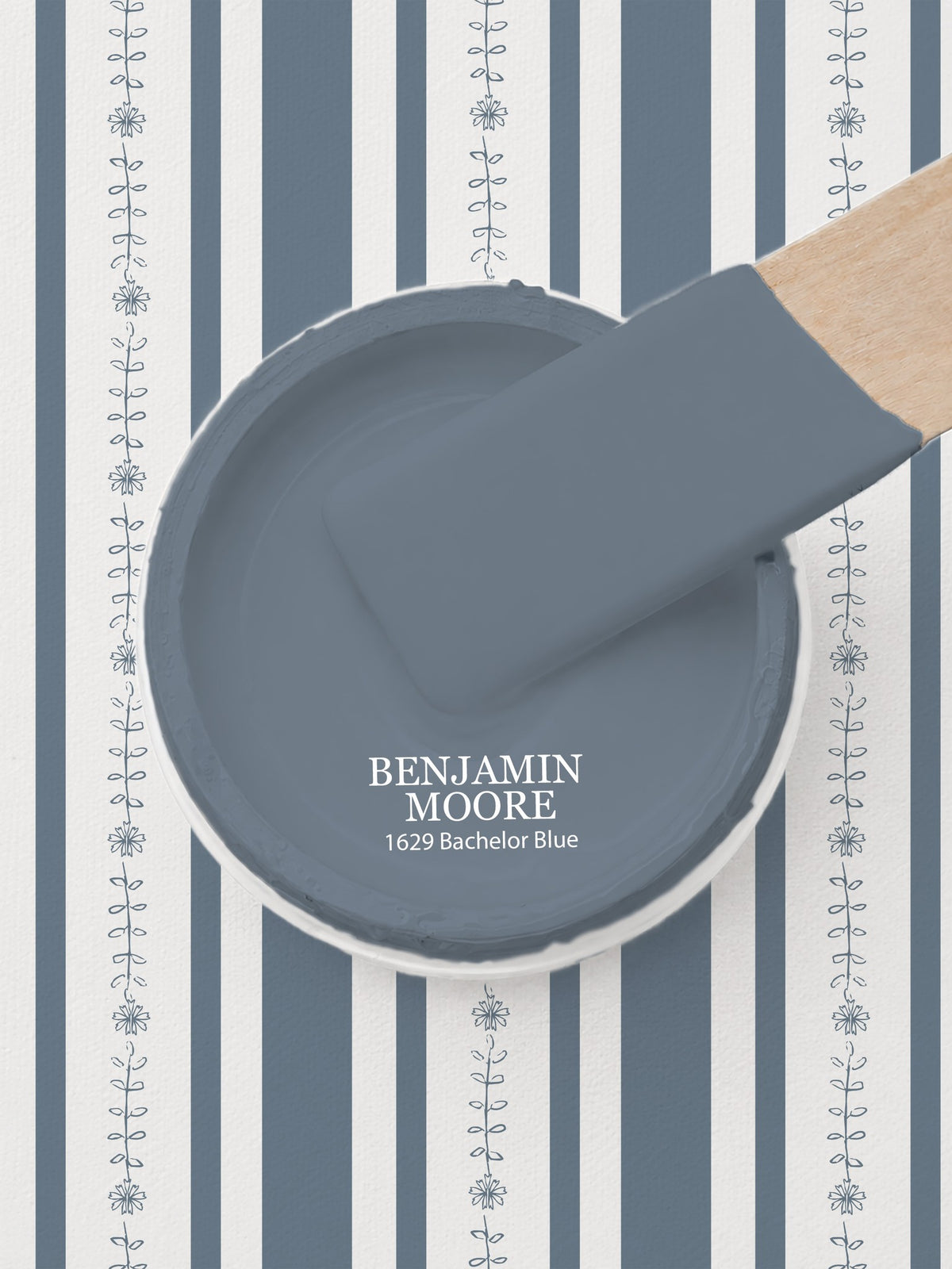 Dark blue floral stripe wallpaper with paint sample.