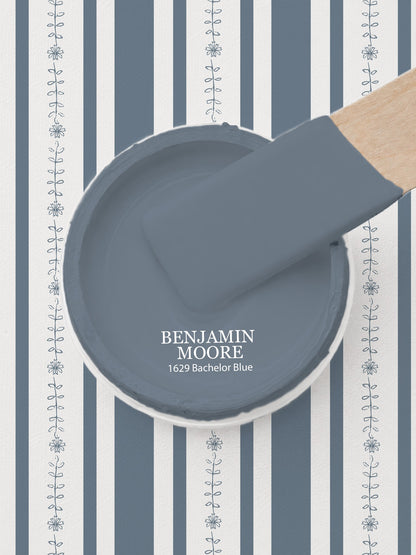 Dark blue floral stripe wallpaper with paint sample.