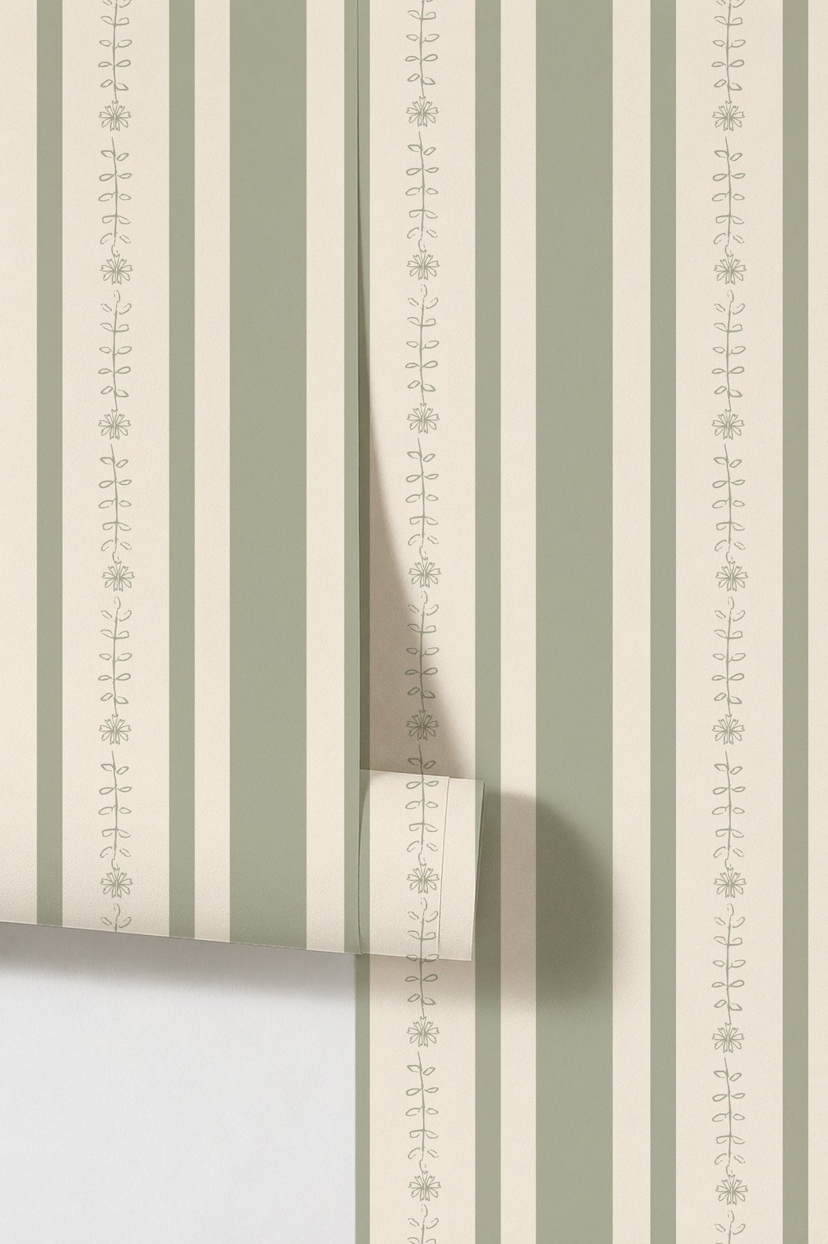 Emma floral stripe olive wallpaper with sage and white vertical stripes and vine pattern.