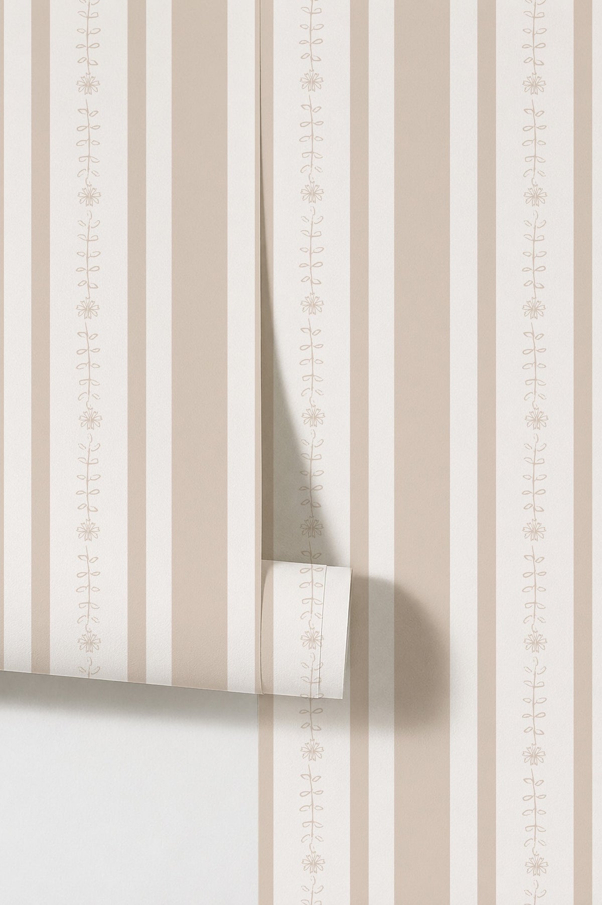 Emma Flower Stripe Wallpaper in sand with beige and white floral vine pattern.