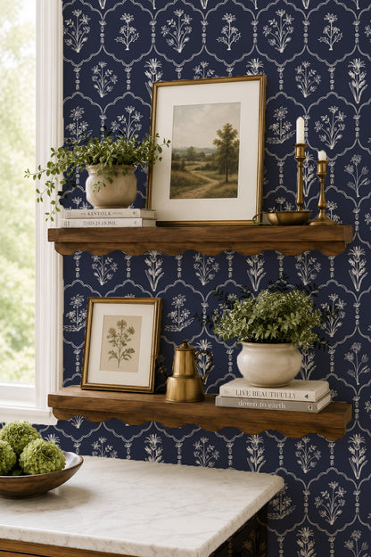 Floral Trellis Blue wallpaper with white motifs in a room with wooden shelves and decor.
