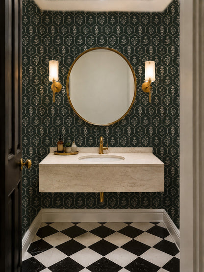 Elegant bathroom with Floral Trellis Green wallpaper, gold fixtures, and checkered floor.