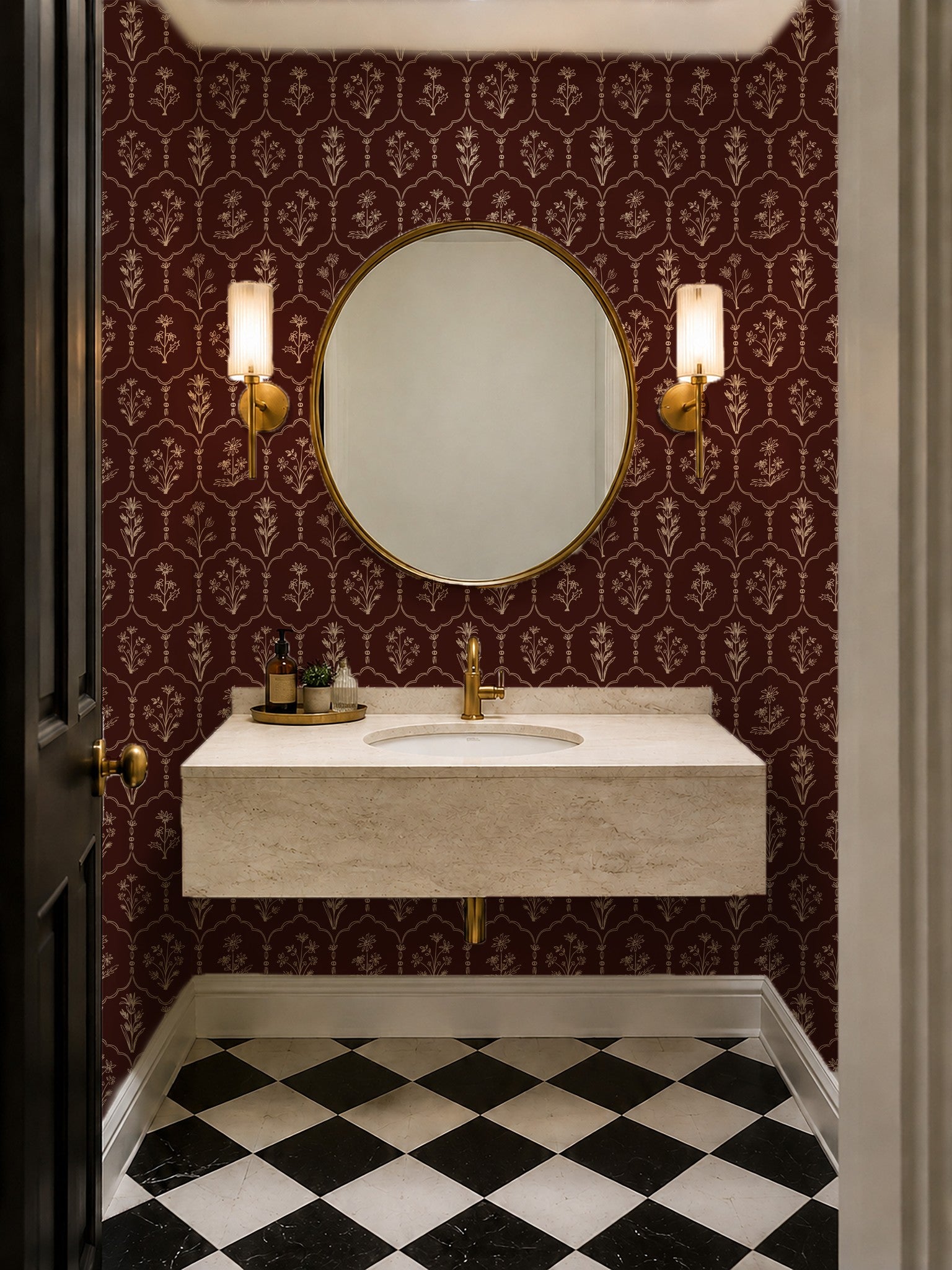 Elegant bathroom with floral trellis red wallpaper and gold accents.