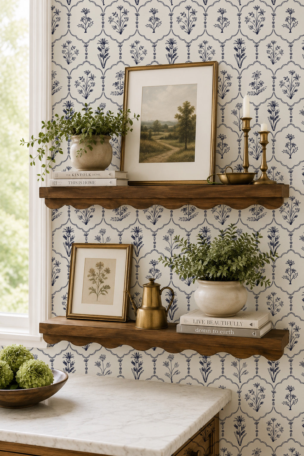 Floral trellis wallpaper with navy motifs in vintage styled room with shelves.