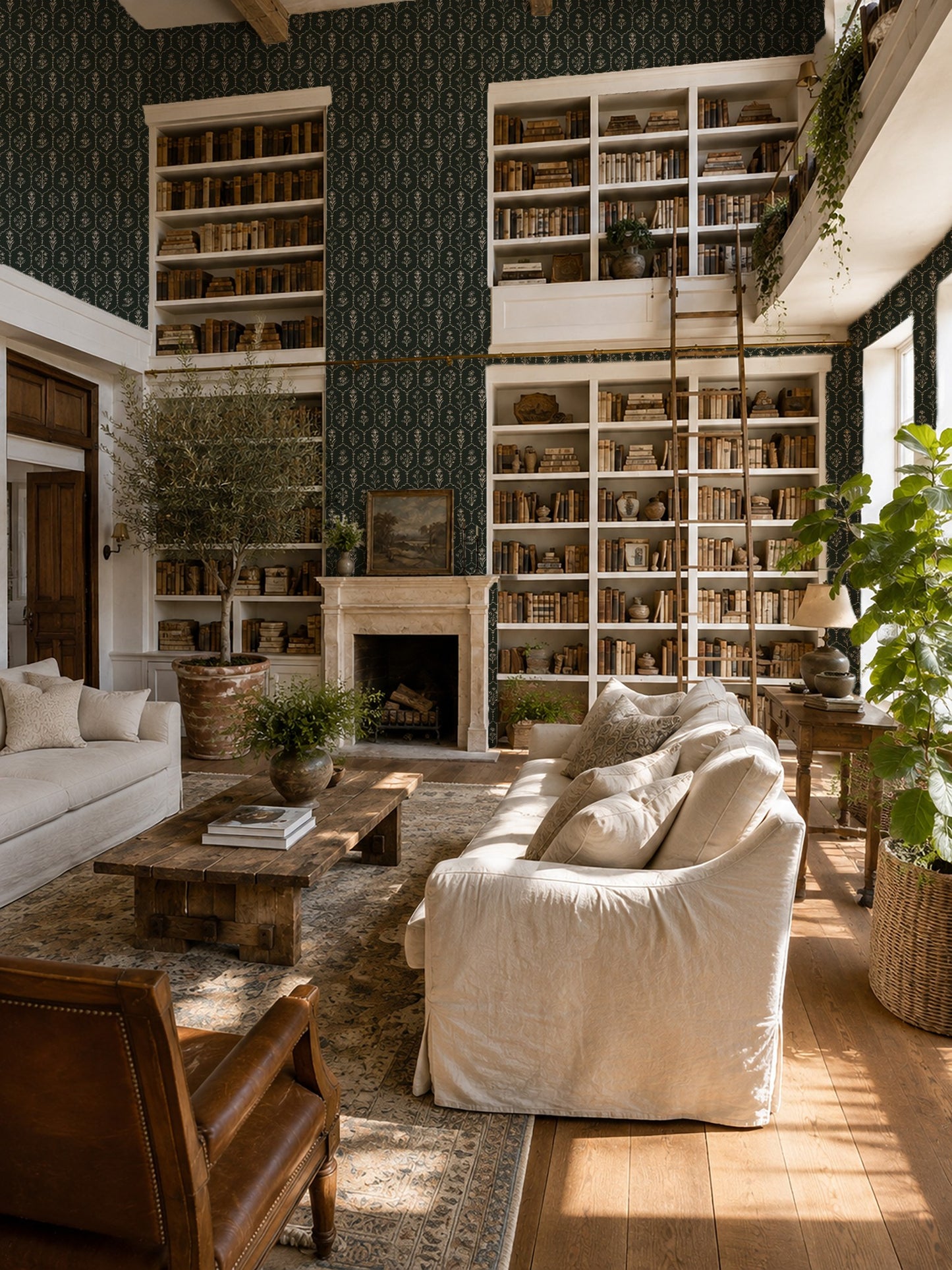 Elegant green floral trellis wallpaper in a cozy library living room with bookshelves and sofas.