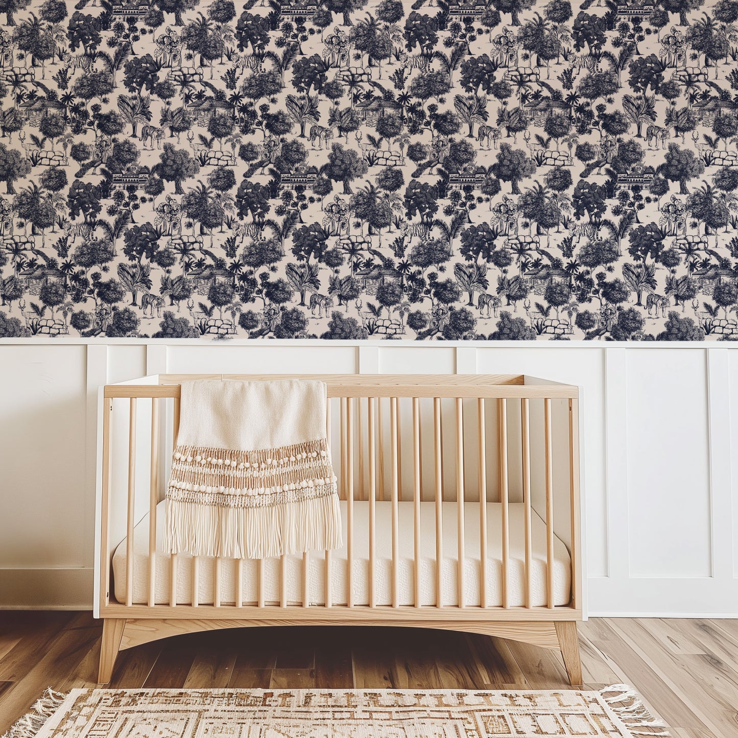 Jungle Toile Blue wallpaper with exotic wildlife in nursery setting.