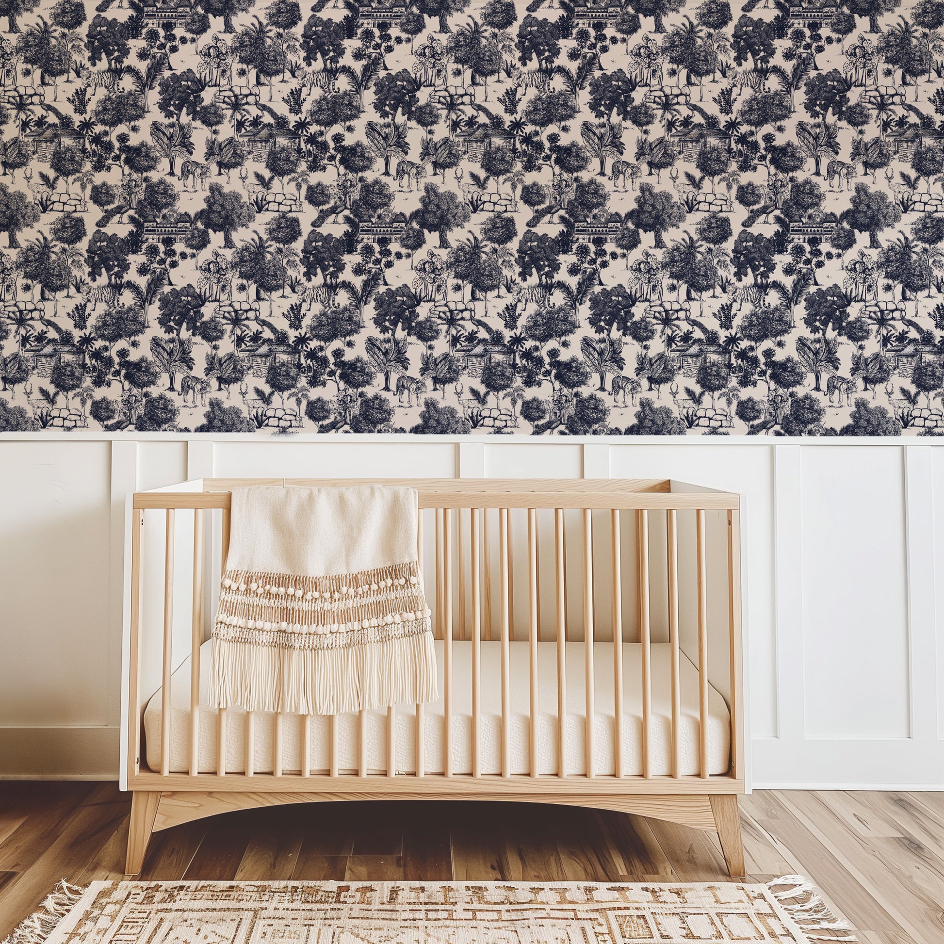 Jungle Toile Blue wallpaper with exotic wildlife in nursery setting.