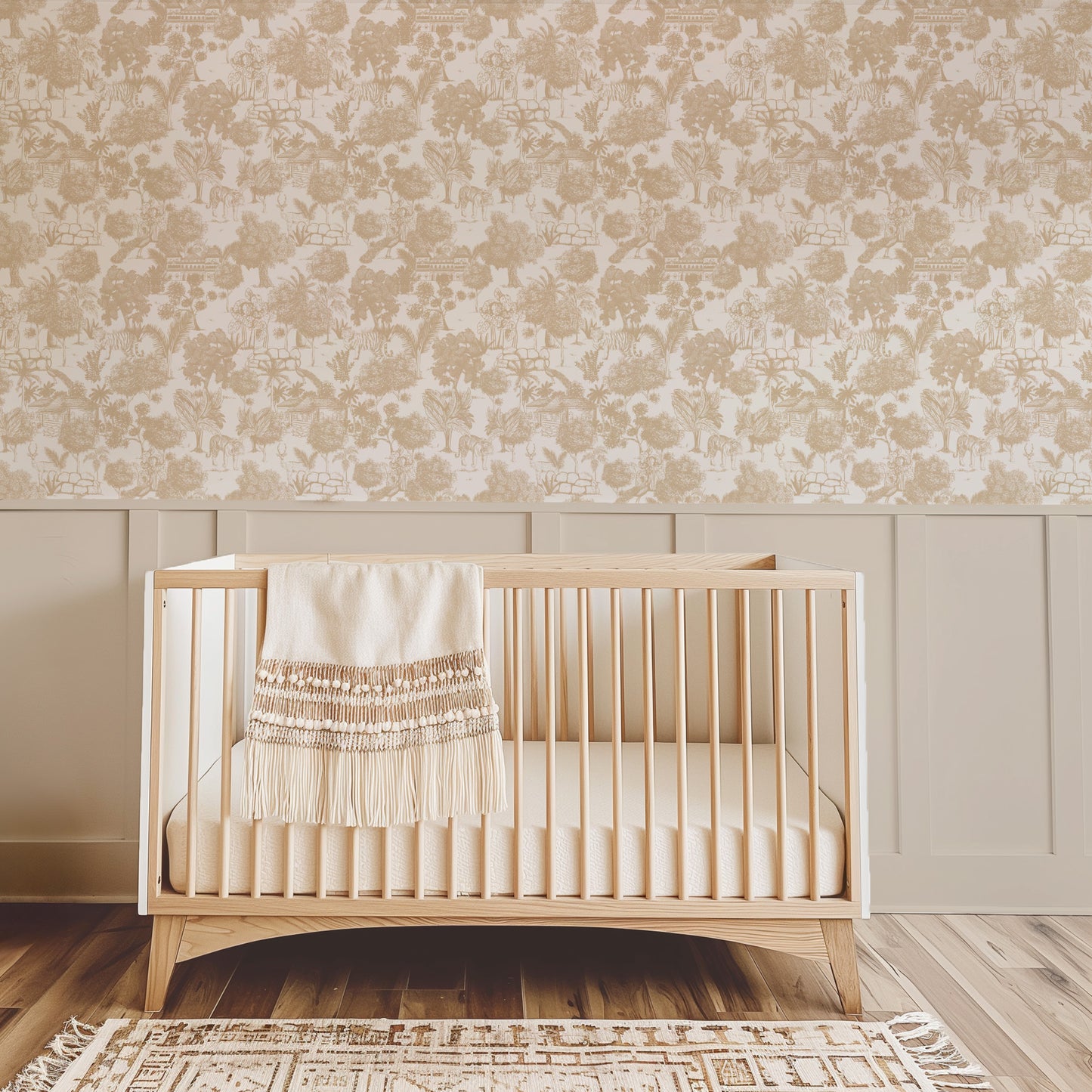 Jungle Toile Cream wallpaper with sepia jungle scene in nursery with crib.