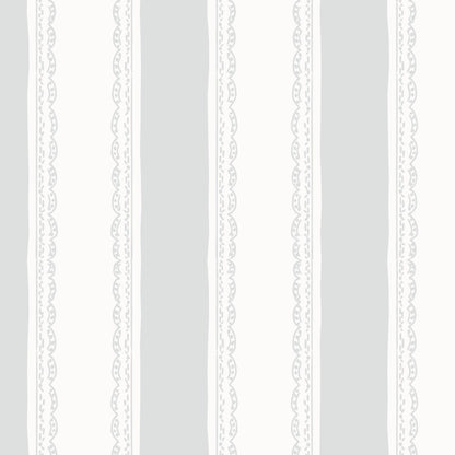 Light blue and white striped wallpaper with lace-like borders.