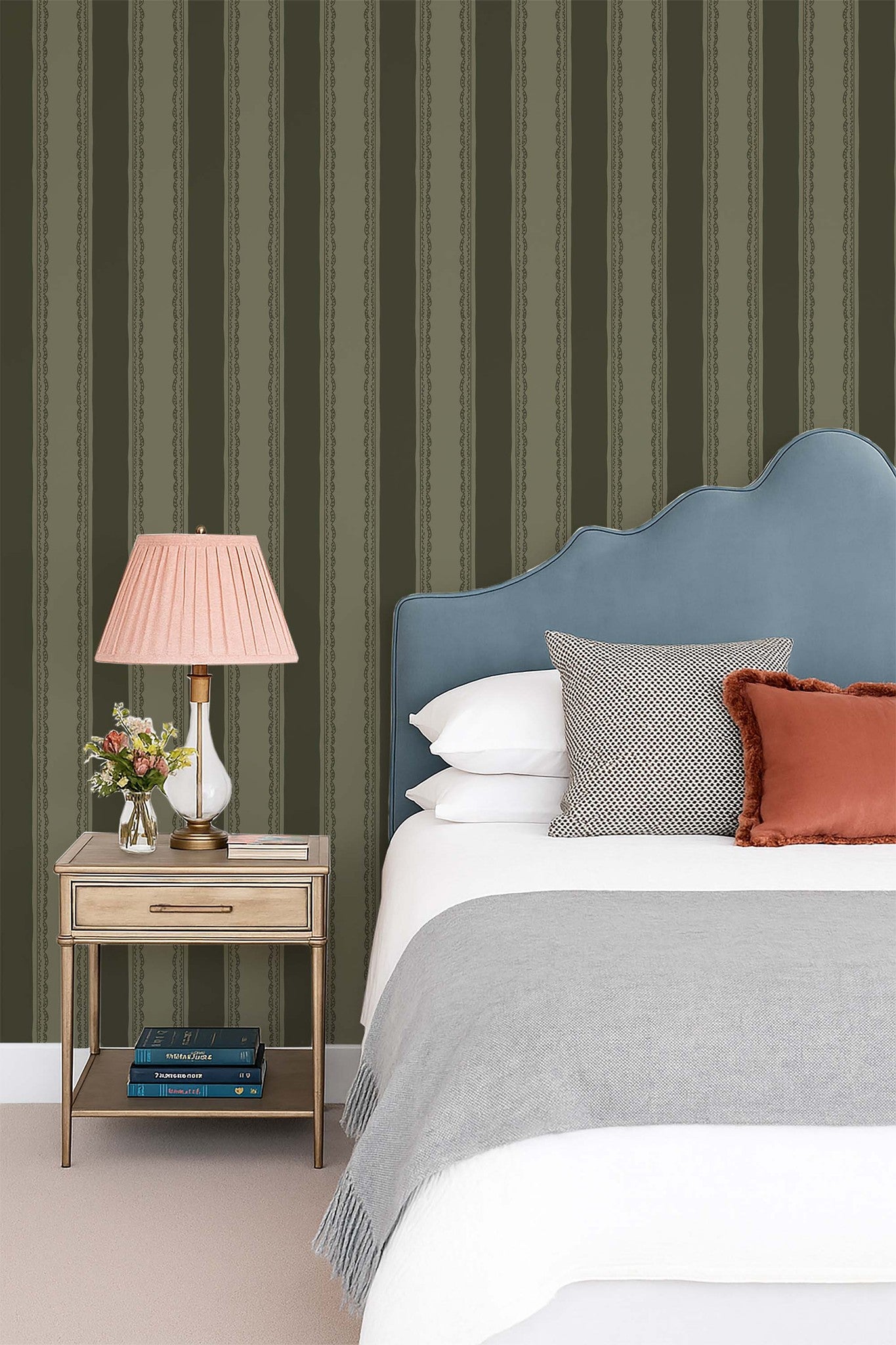 Lacey Stripes Green wallpaper with lace-edged vertical stripes in a cozy bedroom setting.