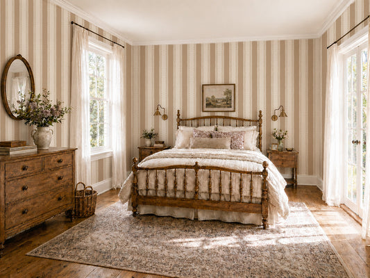 Bedroom with Lacey Stripes Tan wallpaper featuring beige and cream stripes, vintage decor.