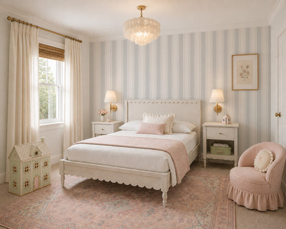Light blue and grey stripe wallpaper in elegant vintage bedroom with soft decor.