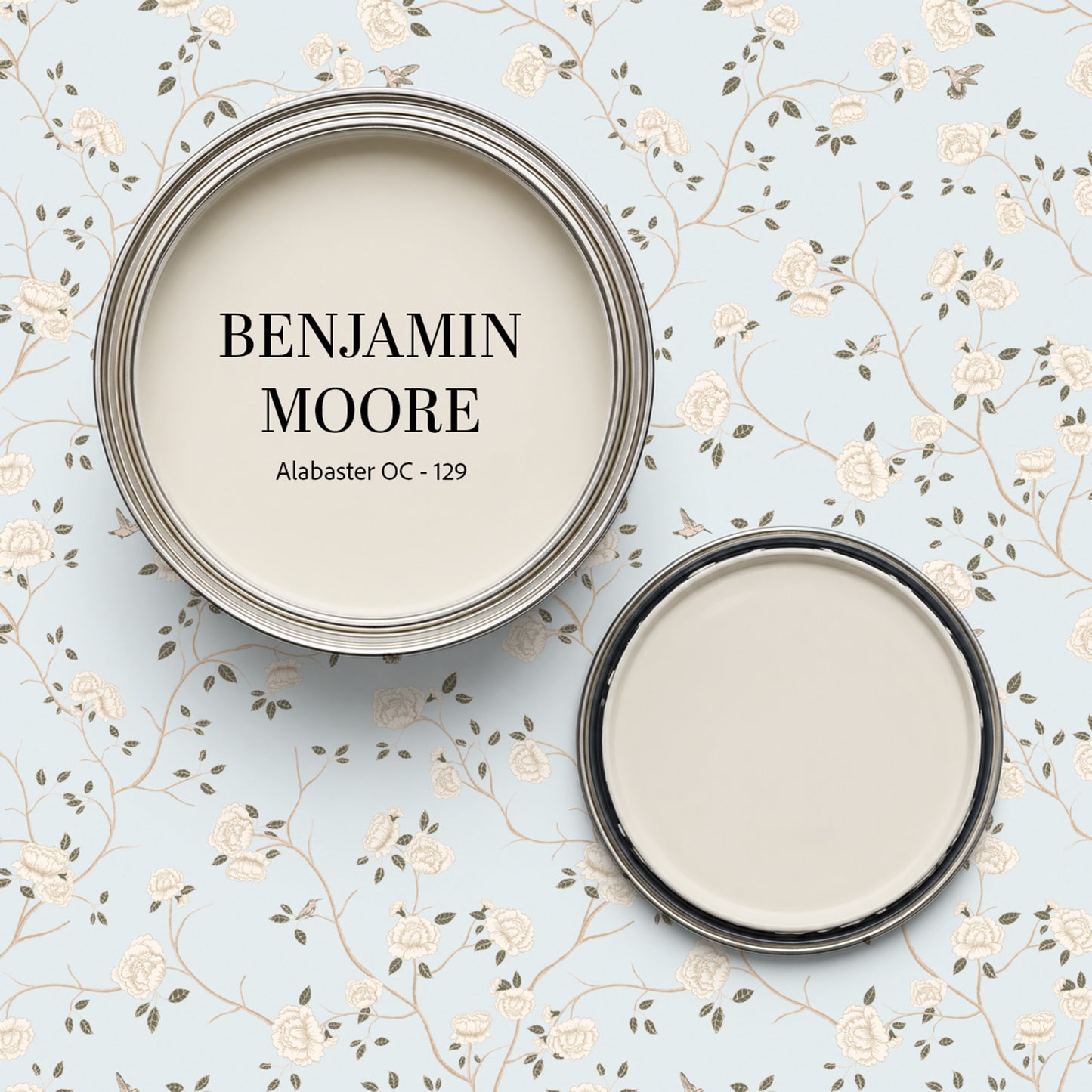 Light blue wallpaper with cream roses and vines, paired with Benjamin Moore Alabaster paint.