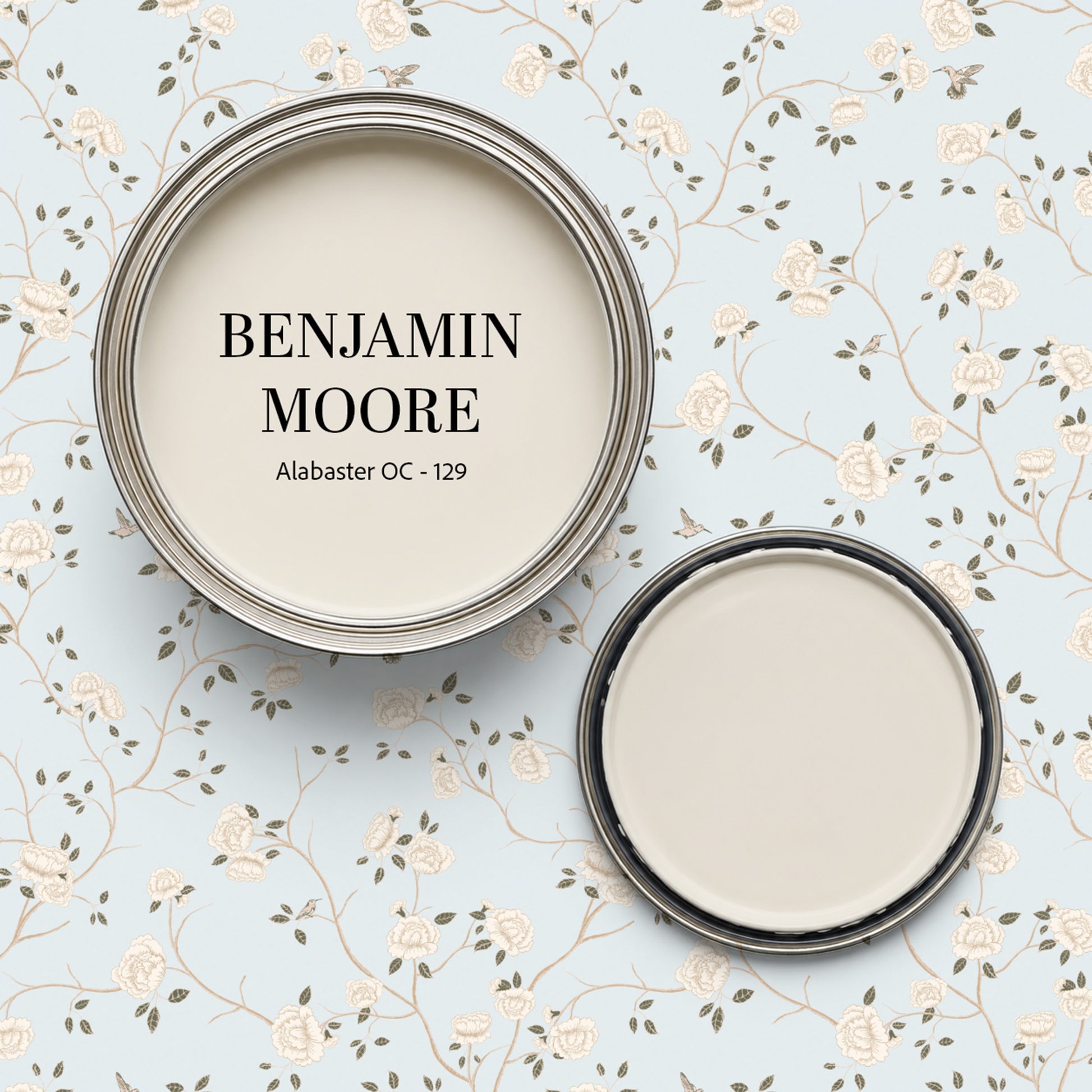 Light blue wallpaper with cream roses and vines, paired with Benjamin Moore Alabaster paint.
