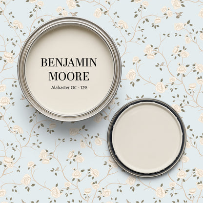 Light blue wallpaper with cream roses and vines, paired with Benjamin Moore Alabaster paint.
