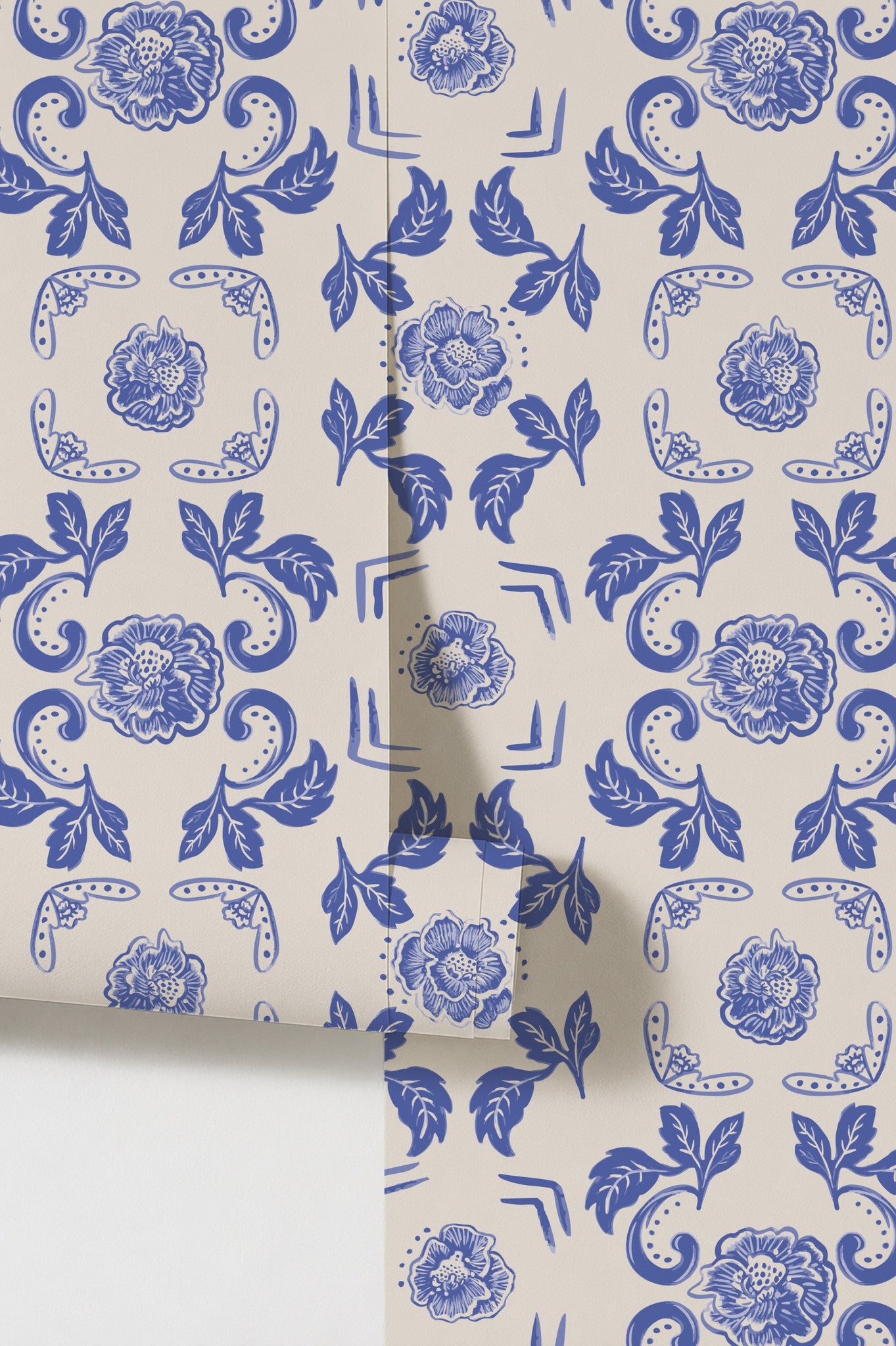 Nora Delft Blue wallpaper with intricate blue floral pattern on cream background.