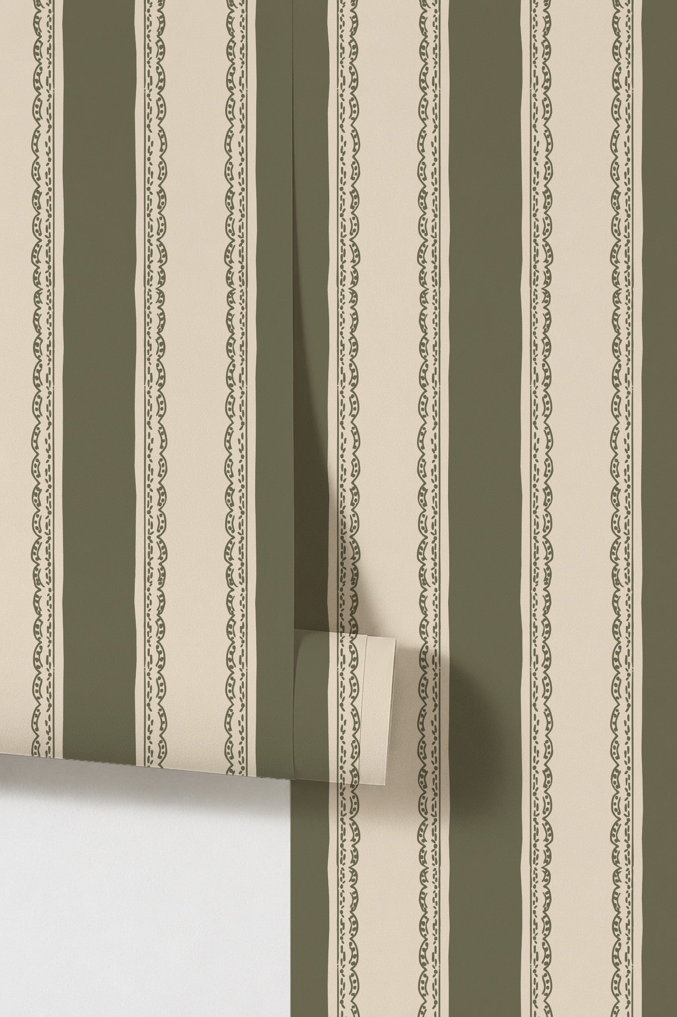 Olive green and cream striped wallpaper with lace detailing.
