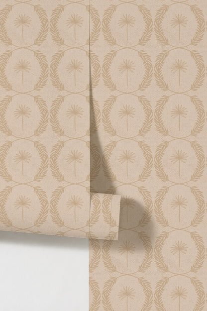 Palm wreath cream wallpaper with beige palm motifs in a wreath pattern.