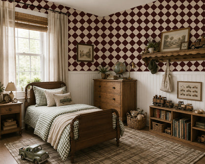 Red and cream diamond wallpaper in cozy vintage-style bedroom with wooden furniture.