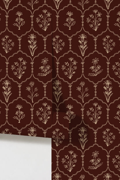 Red floral trellis wallpaper with cream motifs on burgundy background