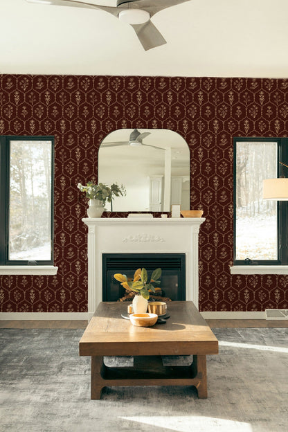 Living room with red floral trellis wallpaper and white fireplace.