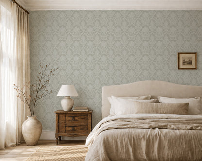 Sage damask wallpaper in elegant bedroom with neutral decor and soft lighting.