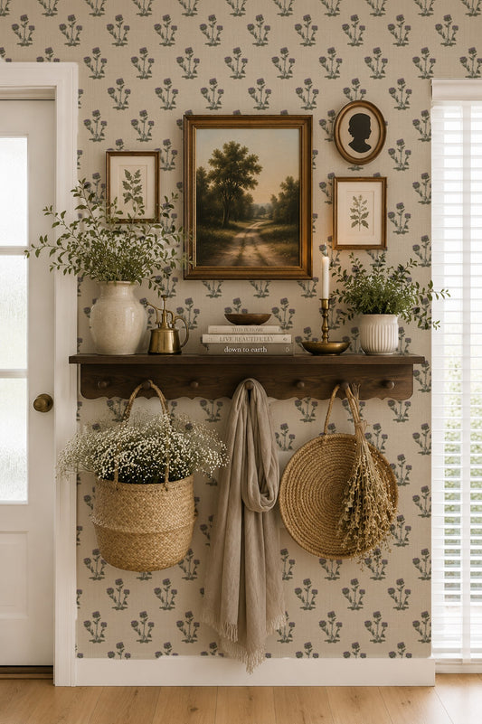 Tan thistle block print wallpaper in vintage decor with shelf and framed art