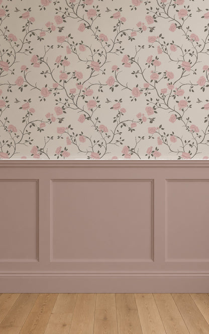 Taupe wallpaper with pink rose and hummingbird pattern in elegant room setting.