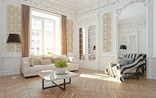 Elegant living room with white and cream damask wallpaper and classic decor.